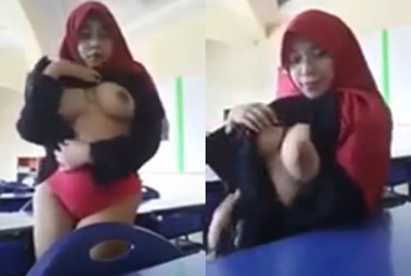 Teacher wearing a headscarf fondles breasts in class